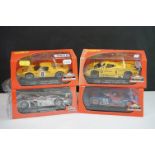 Four boxed/cased Slot it slot cars to include CA18b GT40, Lancia LC2 SICA08A, SC15a Slot Car