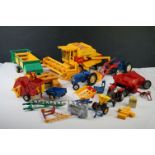 Group of Britains diecast and plastic farming vehicles and accessories to include New Holland TR85