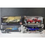 Four boxed 1/18 diecast models to include 2 x Hot Wheels Racing (50170 Juan Pablo Montoya & T26