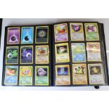 Pokemon - A binder of Pokemon Trading Cards featuring Mewtwo, Machamp, Jungle Snorlax, Jolteon,