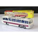 Boxed Dinky 952 Vega Major Luxury Coach diecast model in off white with purple stripes, light wear