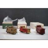 Three boxed HO gauge items of rolling stock to include Trains Inc Santa Fe Side Door Caboose (