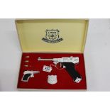 Boxed Lone Star Luger Presentation Set complete with guns, bullets and Special Agent badge