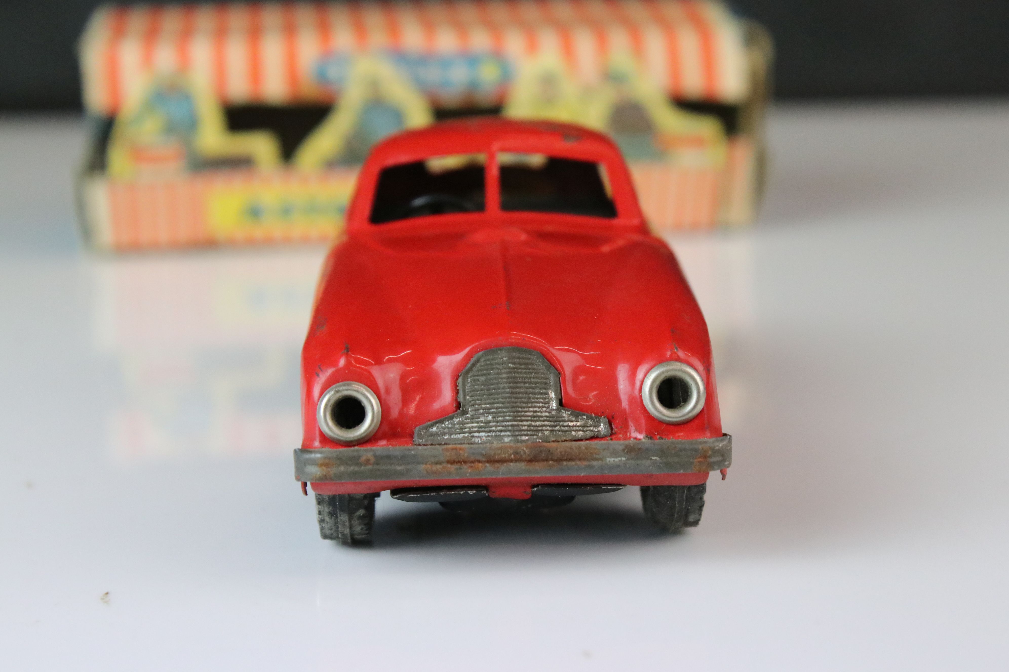 Boxed Scalex tin plate clockwork Aston Martin DB2 model in red, showing play wear with wear to - Image 3 of 8