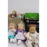 Quantity of various plastic contemporary baby dolls to include a Zapf Creation Nana doll with tag (