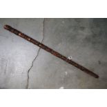 An antique 19th century Folk Art walking stick profusely carved with figures and animals and