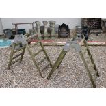 Pair of Wooden and Metal Olympic Gymnasium Co Ltd Trestle Trees, each approx. 90cms wide x 87cms