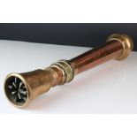 An antique fire fighters brass nozzle.