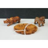 Chinese Faux Boxwood Roundel together with a Boxwood Netsuke in the form of a Rhino and a Black