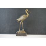 Brass figure of a Heron on marble base