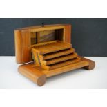 A vintage 1950's wooden cigarette box with space for 48 cigarettes.