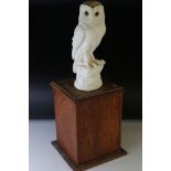 A resin figure of a Barn Owl together with matched wooden oak plinth.