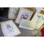 A set of four framed and glazed floral prints and two other similar.