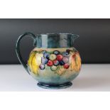 Moorcroft Flambe Leaves and Berries pattern jug signed to underside together with impressed mark and