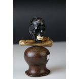 Memento Mori in the form of a Black Stone ? Carved Skull and with Wooden Carved Crossbones, raised