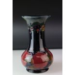 Moorcroft Vase in the Pomegranate pattern, green signature to base with an impressed Moorcroft