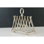 Silver plated toast rack formed with cricket bats