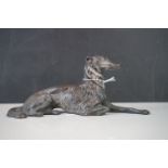 Cast Bronze figure of a lying greyhound