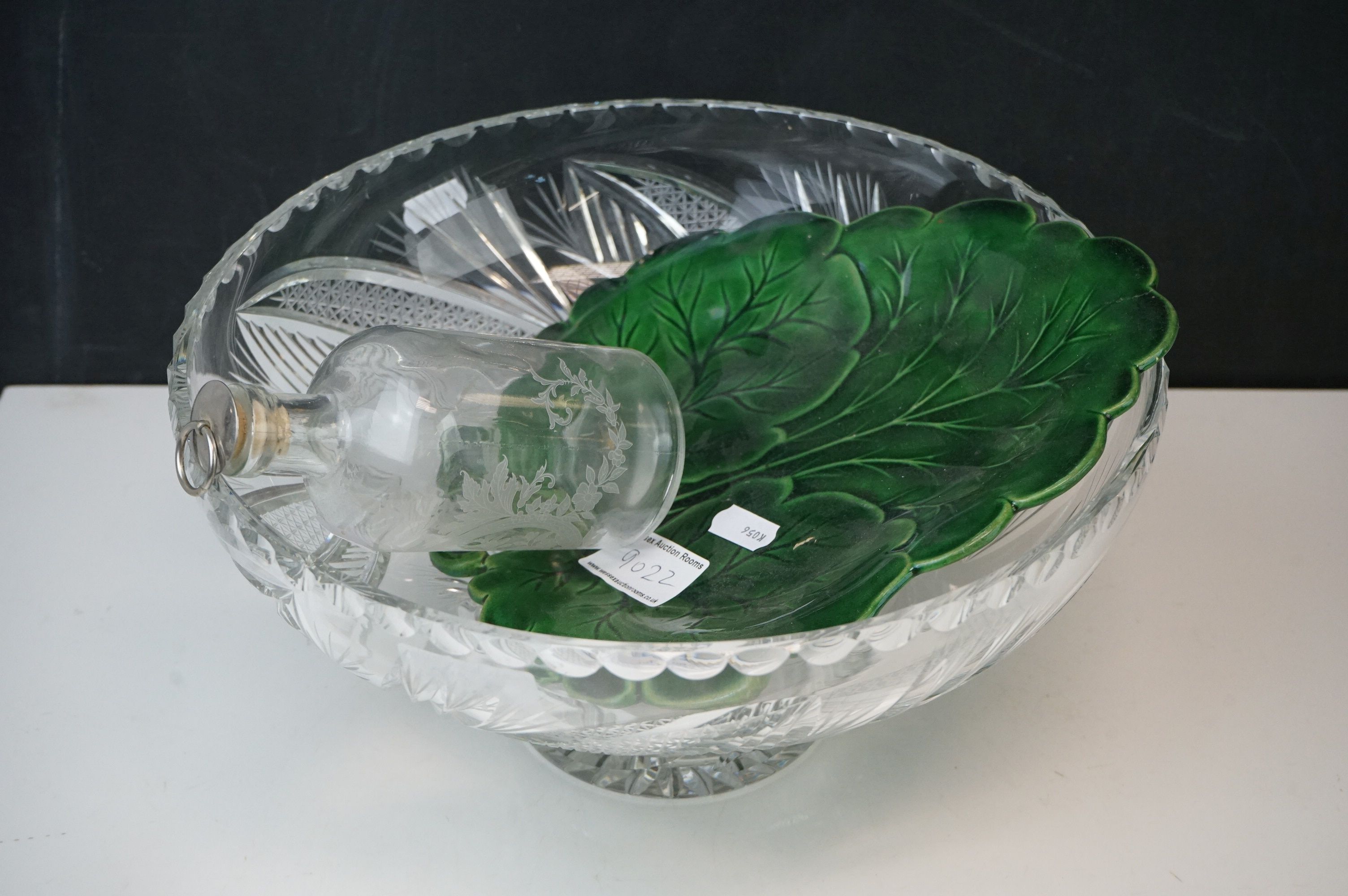 A cut glass fruit bowl an antique green leaf plate together with an etched glass bottle with - Image 13 of 14