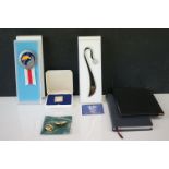 A box of mixed collectables to include a Concorde diary, olympics collectables to include pin badges