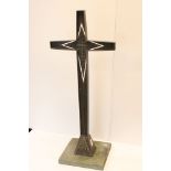 A 1930s French bronze crucifix cross sculpture mounted on a stone plinth.