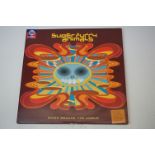 Vinyl - Super Furry Animals Rings Around The World LP on Epic 502413 1, with the 7" single
