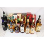 A large collection of bottled alcoholic beverages to include Cognac Courvoisier VSOP, Special