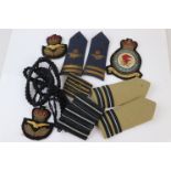 A Collection Of British Royal Air Force Cloth Badges And Shoulder Boards.