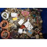 Large tub containing vast quantity of earrings, rings, necklaces, chains, bracelets, beads etc, some