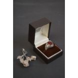 Gentleman's Silver Ring set with an Oval Carnelian together with a Sterling Silver Brooch in the