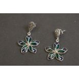 Pair of silver and plique a jour earrings of flower form