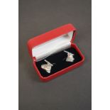 Pair of silver fish head style cufflinks