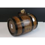 Oak and metal banded barrel with handle and cork stopper