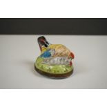 A 19th century enamel trinket box in the form of a Cockerel and Hen.