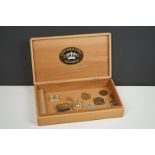 A small group of collectables to include coronation medals, cufflinks and miniature matches and