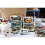 A collection of boxed diecast vehicles to include Land Rovers and tractors.