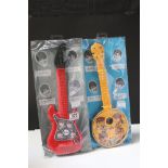 Music Toys - Two 1960s The Beatles plastic toy guitars with original cards within bags, excellent