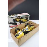 Boxed Battery Operated r/c Motor Roar Racer plastic car, in yellow, with driver, gd overall, box