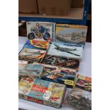 Group of eleven boxed plastic model kits, mostly aircraft, to include Aurora, Lindberg, Airfix, Hawk