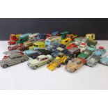 Around 34 mid 20th C play worn mainly Corgi, with Matchbox, Solido & Dinky diecast models to include