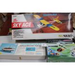 A Nikko radio controlled Sky Ace 1/12 scale model aircraft together with a Nano remote control