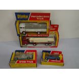 Four boxed Dinky diecast models to include 950 Foden Fuel Tanker, 275 Brinks Truck, 940 Mercedes