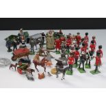 A mixed collection of metal military and farm figures and accessories to include Britains examples.