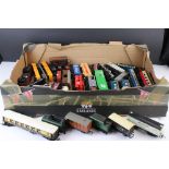 Collection of 38 OO gauge items of rolling stock featuring mainly trucks and wagons to include