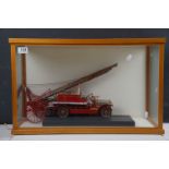 A cased kit built model of a L.C.C. London fire brigade fire engine, case measures approx 63 x 39