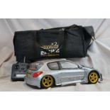 A Kyosho 1/10 Nitro Peugeot 206 Swedish rally D Auriol / L Mear car 4WD and Hitec Ranger II, Radio