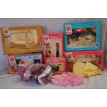 A collection of vintage 1980's Sindy accessories to include 44582 Dining tables and chairs, 44234