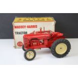 Boxed Lesney Products Scale Model Massey Harris Tractor in red with cream hubs, diecast vg, tatty