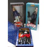 Two boxed Franklin Mint vinyl dolls to include Grease Sandy and Harley Davidson, both vg, previously