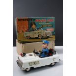 Boxed Nomura TN Trade Mark (Japan) tin plate Battery Powered Mystery Police Car in vg condition,